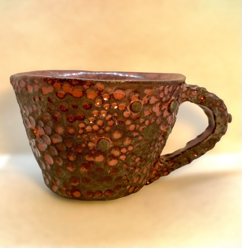 Pasta negra. Interior morado exterior bajorelieve morado